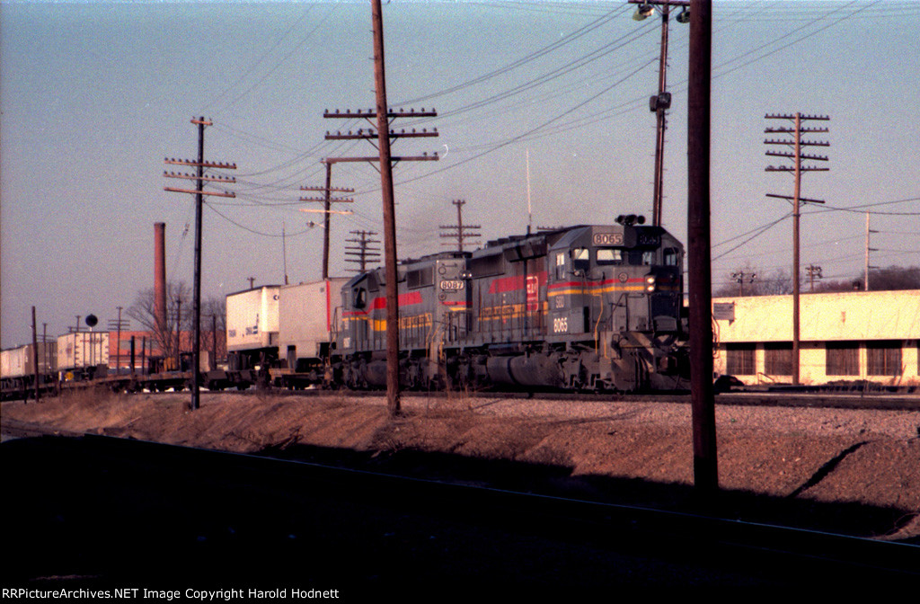SBD 8065 & 8087 lead a southbound pig train